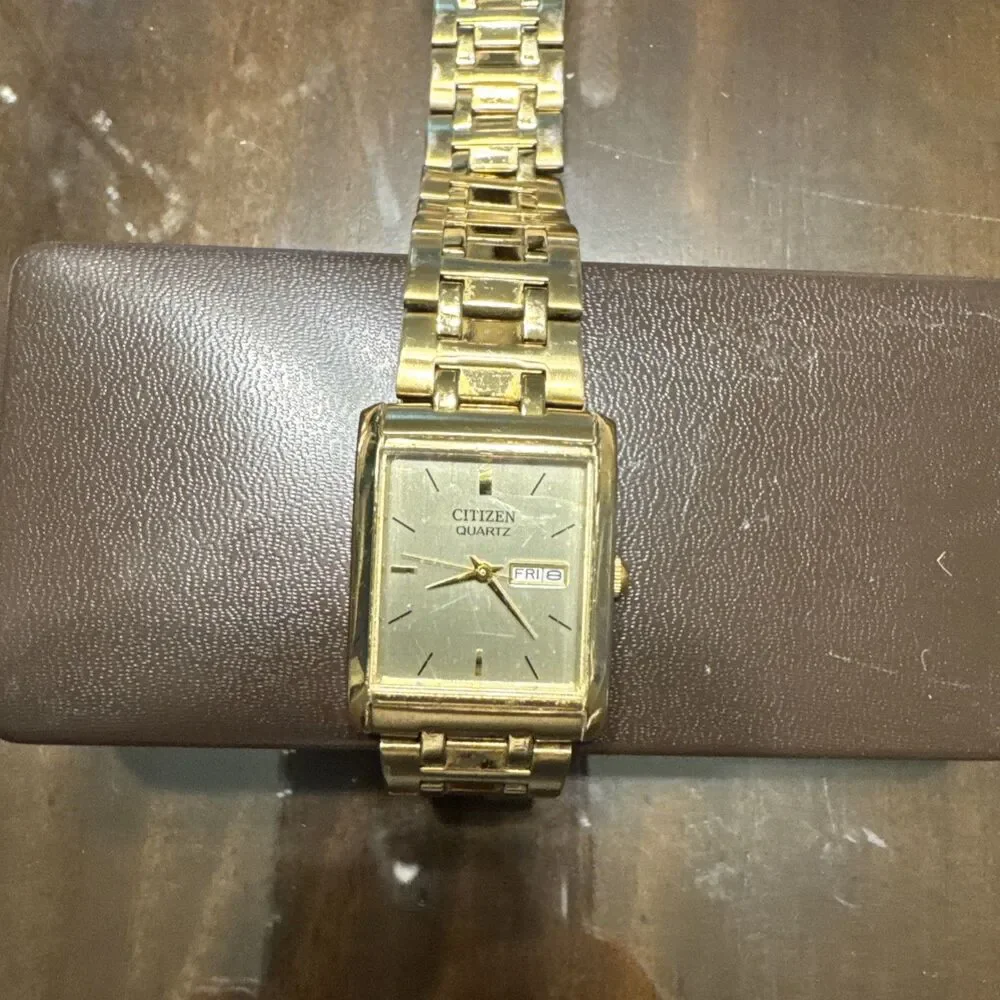 Citizen Quartz Mens Gold Tone Rectangular Day Date tank Watch 1002-S99299 HSB